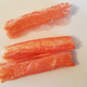 Three individually wrapped crab sticks